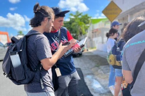 Young Americans in Puerto Rico filling out an opinion survey